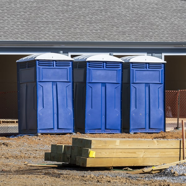 what is the cost difference between standard and deluxe portable restroom rentals in Herman NE